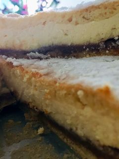 Una foto de Torta de ricota y dulce de leche