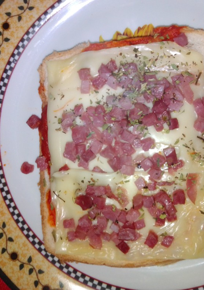 Una foto de Pizza individual en pan de molde