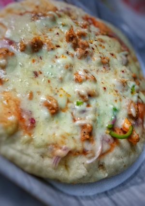 A picture of Chicken Cheesy Tikka Pizza!.