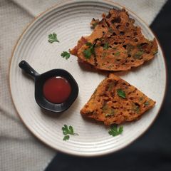 A picture of Tomato uttapam.