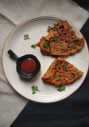 A picture of Tomato uttapam.