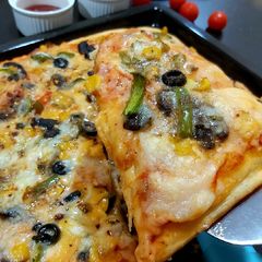 A picture of Mushroom dual cheese Pizza.