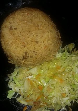A picture of Pilau served with Veges.