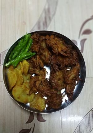 A picture of Kandha and Batata bhaji.