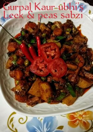 A picture of Leek & peas sabzi🥕🌿🫛🍅🧅.