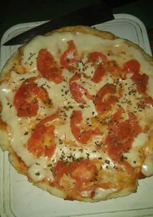 Una foto de Pizza vegan napolitana