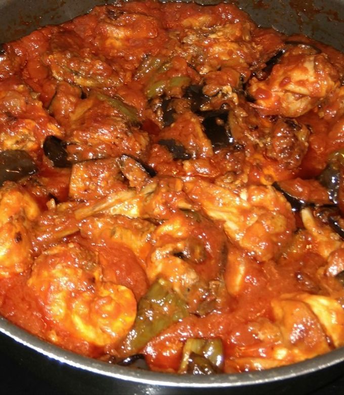 Foto principal de Conejo con tomate, pimiento y berenjena