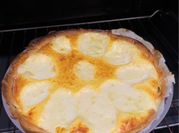 Una foto de quiche espinacas