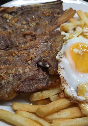 Una foto de Bife al ajito