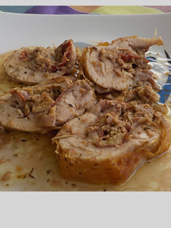 Una foto de Muslos y contramuslos de pollo rellenos al horno