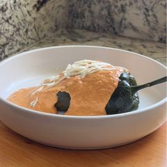 A picture of Chile Relleno with Picadillo and Chipotle Sauce.