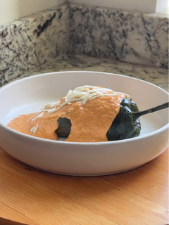 A picture of Chile Relleno with Picadillo and Chipotle Sauce.