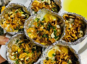 Hình của món Hàu nướng giấy bạc bằng chảo.