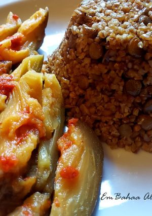 A picture of Mujadara with Pickled Baby Eggplant.