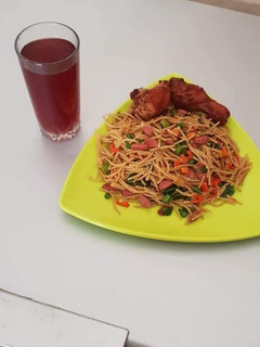 A picture of Garnished spagetti.
