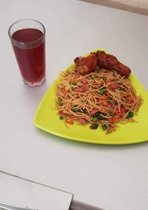 A picture of Garnished spagetti.
