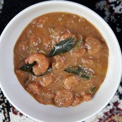 A picture of Prawns in coconut curry.