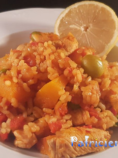 Una foto de Arroz con pollo y calabaza