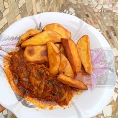 A picture of Fried sweet potato with cabbage-onion sauce.