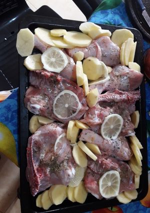Una foto de Pollo al horno con papas