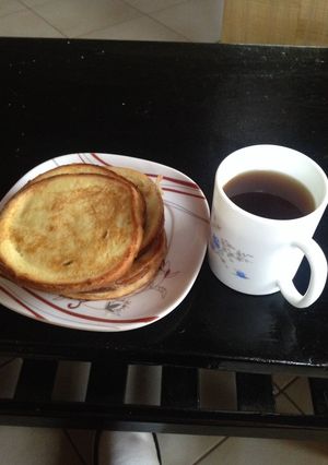 A picture of French Toast and coffee.