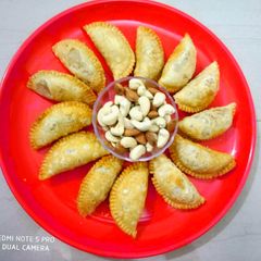 A picture of Traditional mawa      Gujiya.
