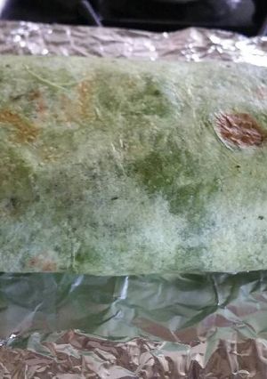 A picture of Spinach wrap Bacon and Egg Breakfast Burrito.