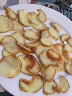 Una foto de Patatas tipo chips light al horno