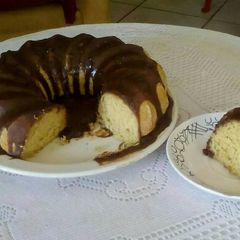 A picture of Lemon Chiffon Cake with Caramel Chocolate Sauce.