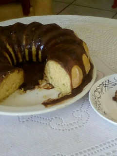 A picture of Lemon Chiffon Cake with Caramel Chocolate Sauce.