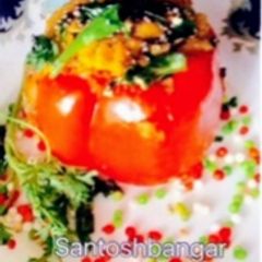A picture of Dhokla stuffed Red Capsicum.