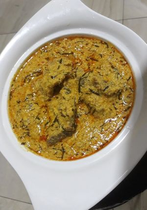 A picture of Egusi soup with ukazi.