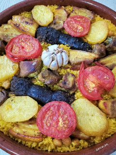 Una foto de Arroz al horno -arròs al forn-