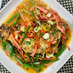 A picture of Crispy fried Red Snapper fish in Thai style tamarind sauce.
