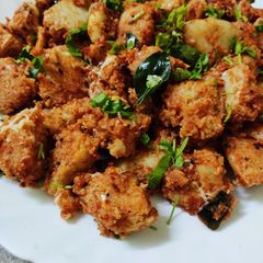 A picture of Tomato masala idli.