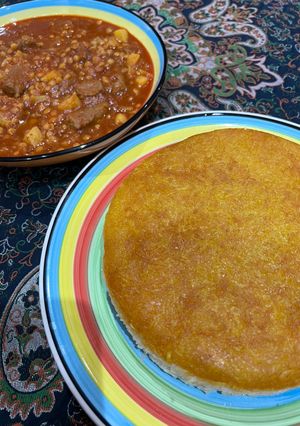 عکسی از دستور ته دیگ سیب زمینی رنده شده