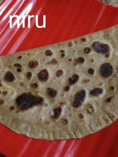 A picture of Chini paratha / Sugar paratha.