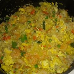 A picture of Shrimp fried cauliflower rice with eggs.