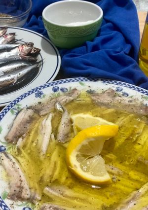 A picture of Microwave Marinated Anchovies with Olive Oil, Lemon, Salt, and Pepper.