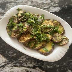 A picture of Grilled Eggplants with dressing.