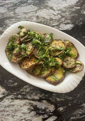 A picture of Grilled Eggplants with dressing.