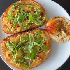 Egg-cellent Cheesy Arugula Morn 🍳🧀🌿 A picture of Egg-cellent Cheesy Arugula Morn 🍳🧀🌿.