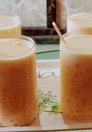 A picture of Orange Tapioca Pearls Drink.