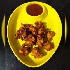 A picture of Sweet corn pakora / corn bhajiya.