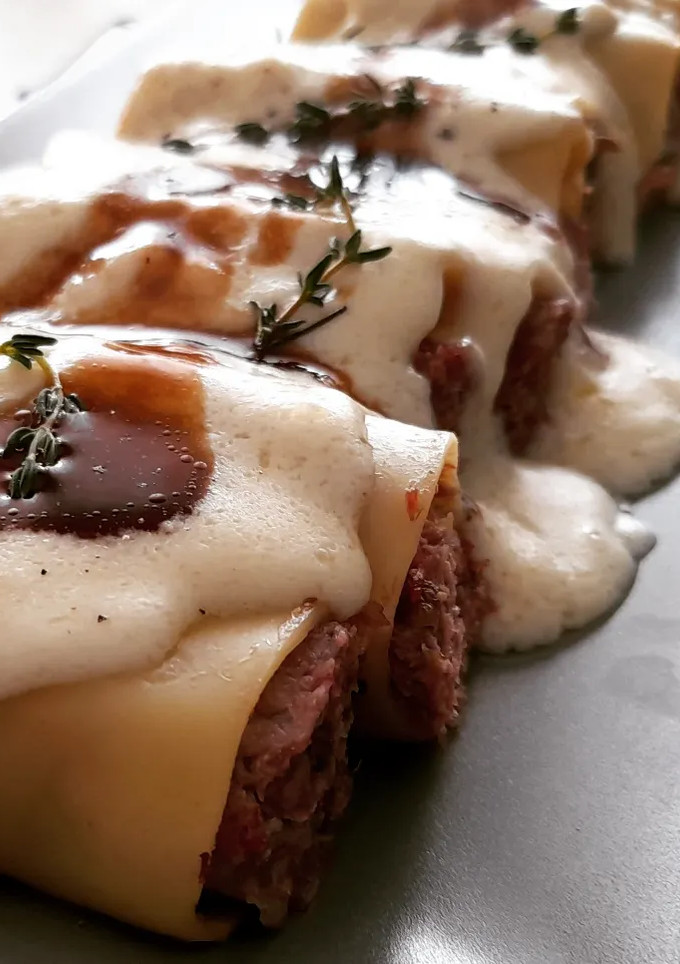 Una foto de Minicanelones de confit de pato y moixernons