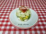 Una foto di antipasto con melone