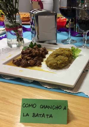 Una foto de Cerdo agridulce con puré de batata