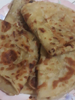 A picture of Soft layered white chapati.