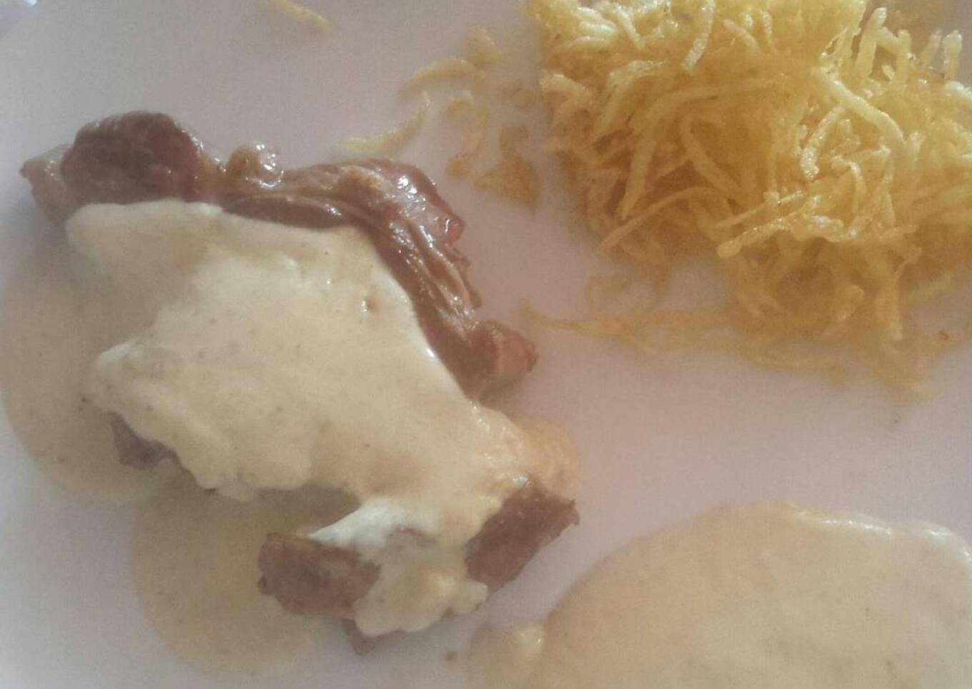 Solomillo en a la pimienta verde