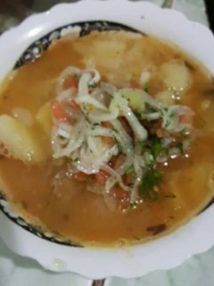 Una foto de Encebollado de Albacora